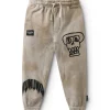 NUNUNU Kooky Skull Sweatpants